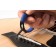 MusicNomad MN290 Bridge Pin Puller Action 2